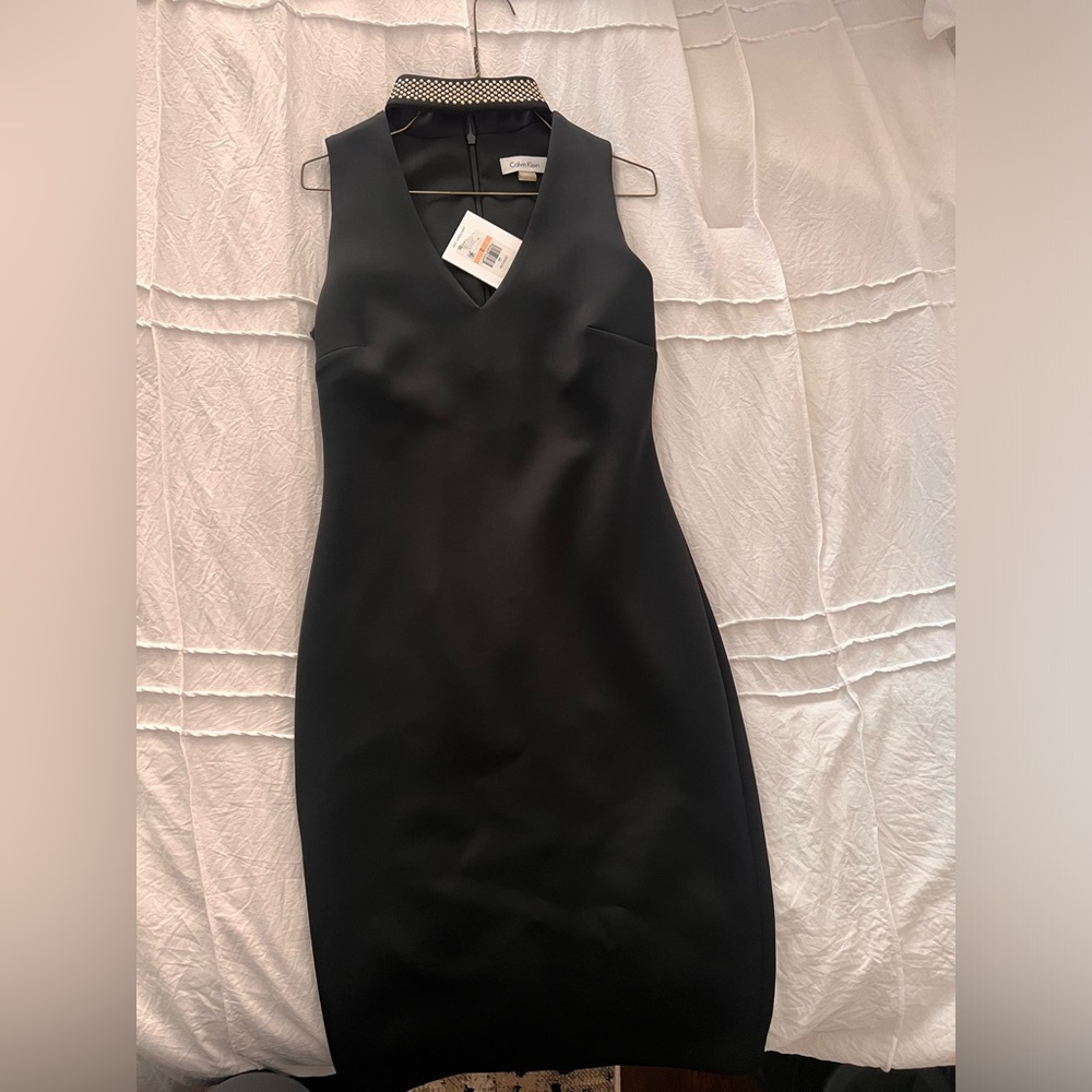 Black Calvin Klein dress size 2. Never worn with tag in it.